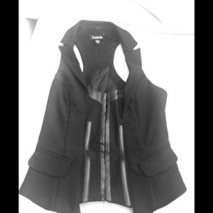BEBE vest Black fabric with Leather Trim.
